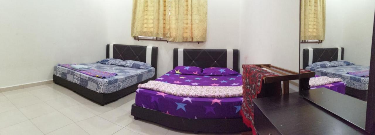 Assyifa Homestay Дунґун Екстер'єр фото