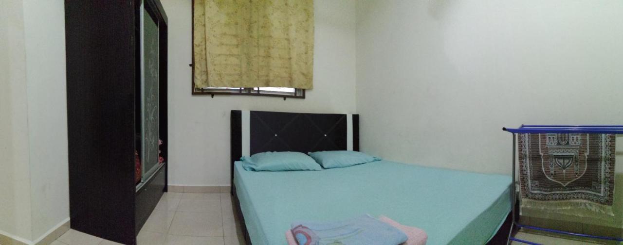Assyifa Homestay Дунґун Екстер'єр фото