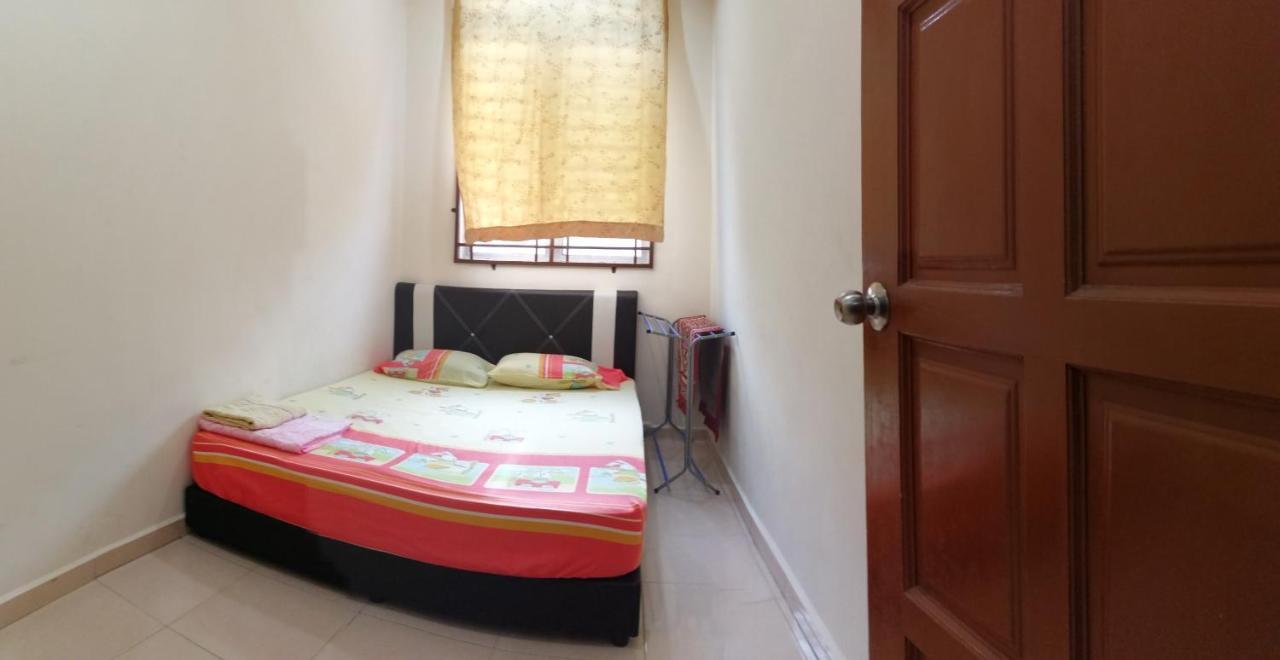 Assyifa Homestay Дунґун Екстер'єр фото
