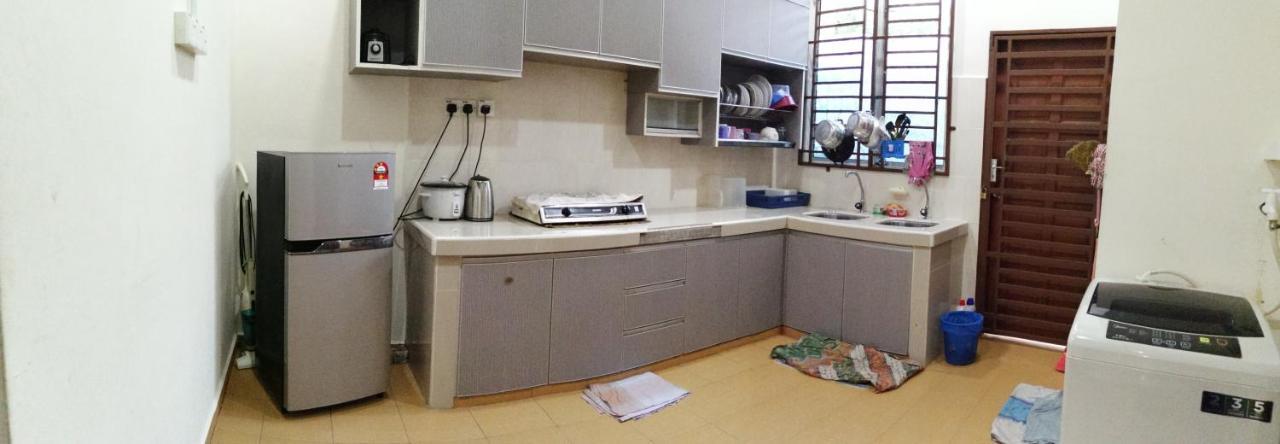 Assyifa Homestay Дунґун Екстер'єр фото