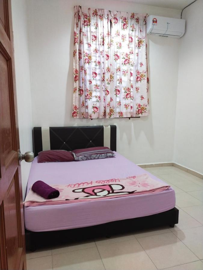 Assyifa Homestay Дунґун Екстер'єр фото