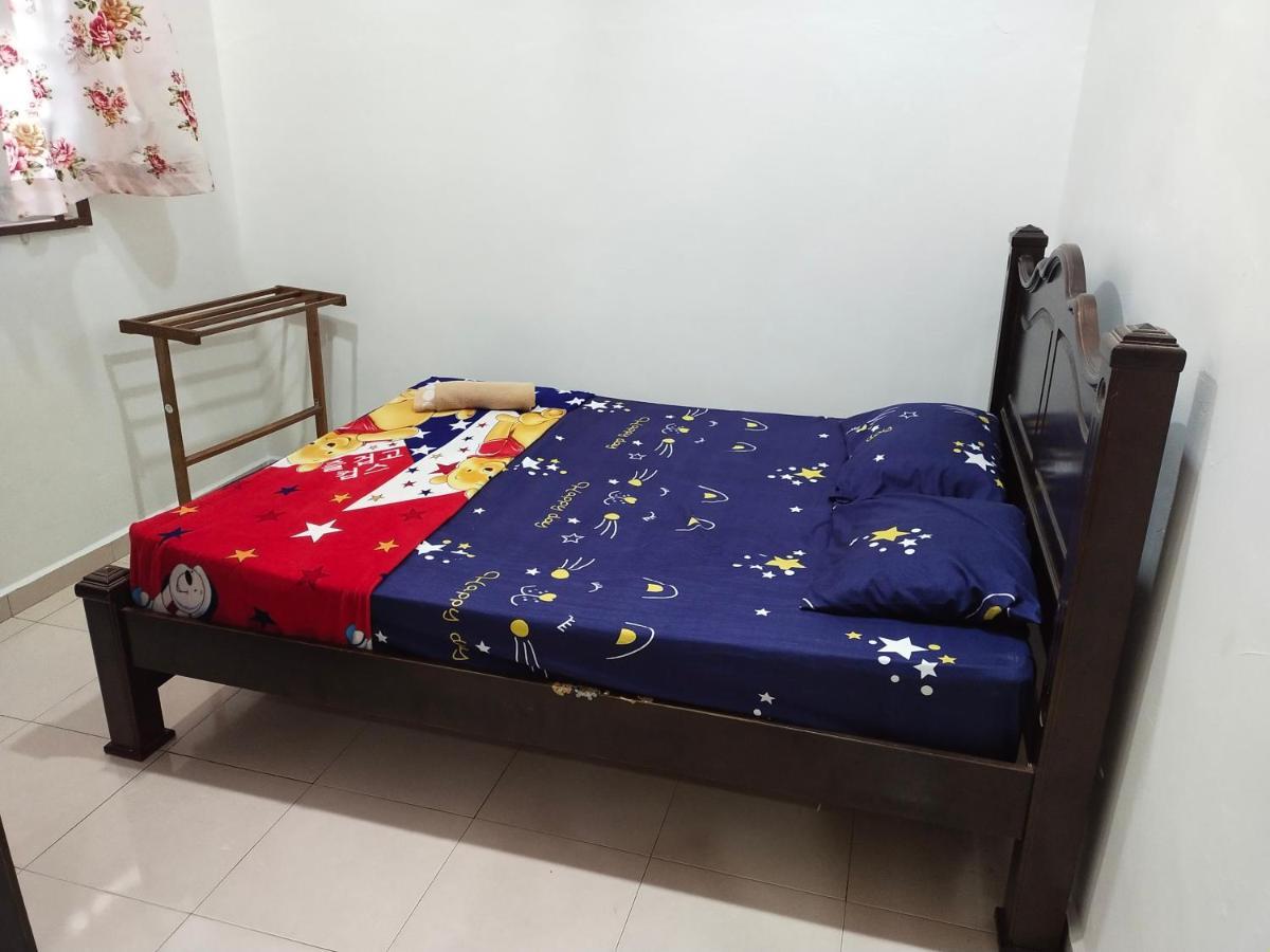 Assyifa Homestay Дунґун Екстер'єр фото