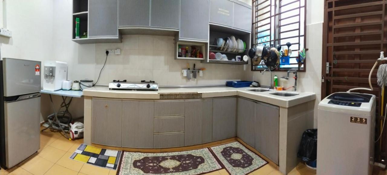 Assyifa Homestay Дунґун Екстер'єр фото